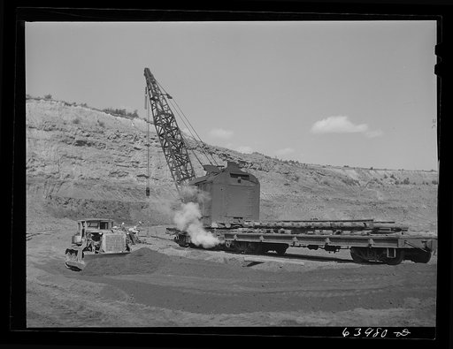 Untitled photo, possibly related to: Moving railroad track in Mahoning pit. Hibbing, Minnesota