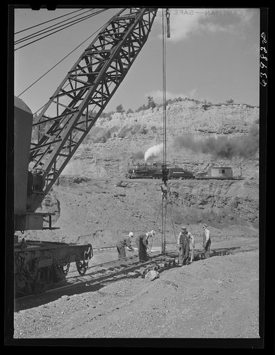 Moving railroad track in Mahoning pit. Hibbing, Minnesota