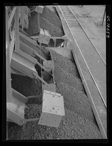 Untitled photo, possibly related to: Loading car with washed ore at concentration plant near Bovey, Minnesota