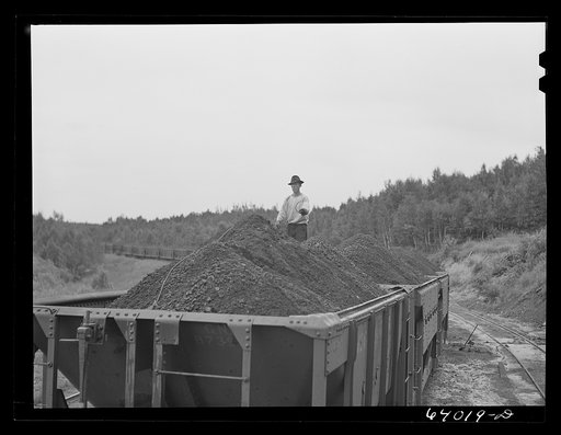 Untitled photo, possibly related to: Taking sample of iron ore before it leaves the concentration plant. Bovey, Minnesota