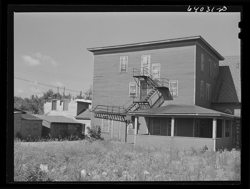 Closed school in the old part of Hibbing, Minnesota. In 1919 when iron ore was found to lie under the town, many buildings were moved a mile south to what is the site of modern Hibbing