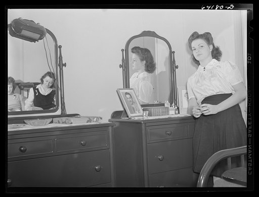 Girls who work at Aberdeen proving grounds and share a room in FSA (Farm Security Administration) dormitory for defense workers. Aberdeen, Maryland