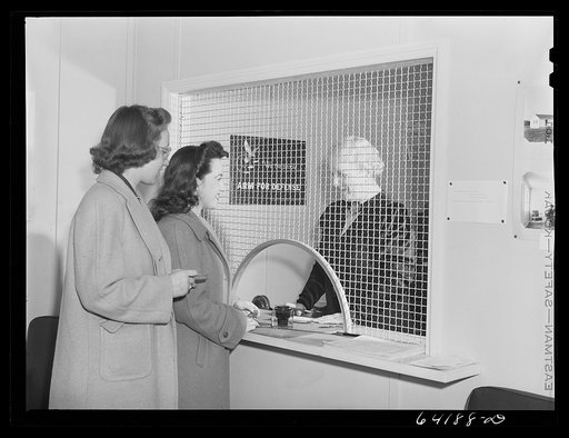 Girls who work at Aberdeen proving grounds paying rent for room in dormitory for defense workers. Aberdeen, Maryland