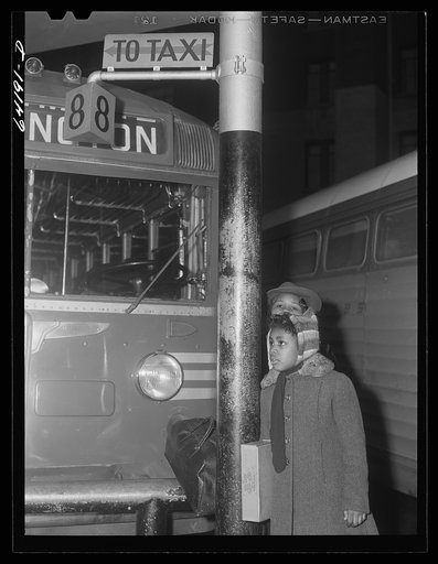 Washington, D.C. Greyhound bus terminal on the day before Christmas. Little girl waiting