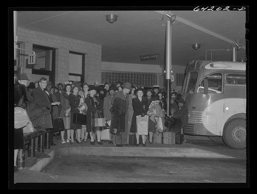 Untitled photo, possibly related to: Washington, D.C. Greyhound bus terminal on the day before Christmas. Boarding a bus to Richmond