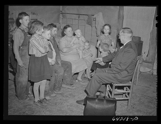 Untitled photo, possibly related to: Scott County, Missouri. Country doctor visiting farm family