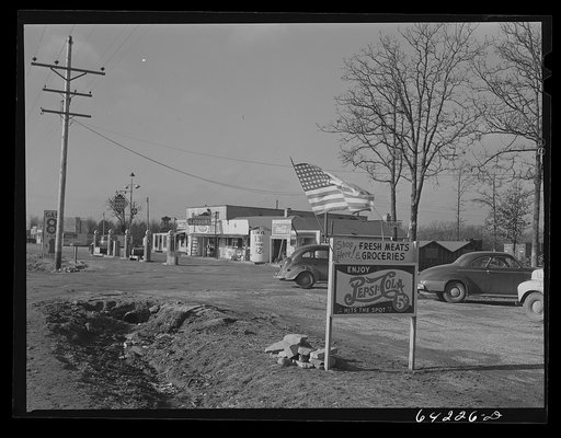 Newton County, Missouri. Camp Crowder area. Construction work began in September 1941. Trailer camps, cabins, hotels, liquor stores, cafes, and night clubs stretch along U.S. Highway No. 71 bordering the camp for about ten miles