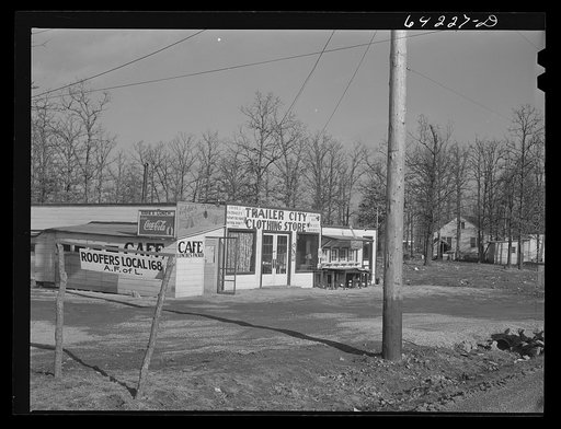 Newton County, Missouri. Camp Crowder area. Construction work began in September 1941. Trailer camps, cabins, hotels, liquor stores, cafes, and night clubs stretch along U.S. Highway No. 71 bordering the camp for about ten miles
