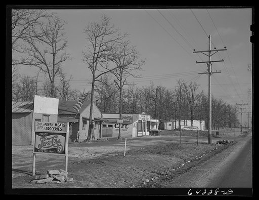 Newton County, Missouri. Camp Crowder area. Construction work began in September 1941. Trailer camps, cabins, hotels, liquor stores, cafes, and night clubs stretch along U.S. Highway No. 71 bordering the camp for about ten miles