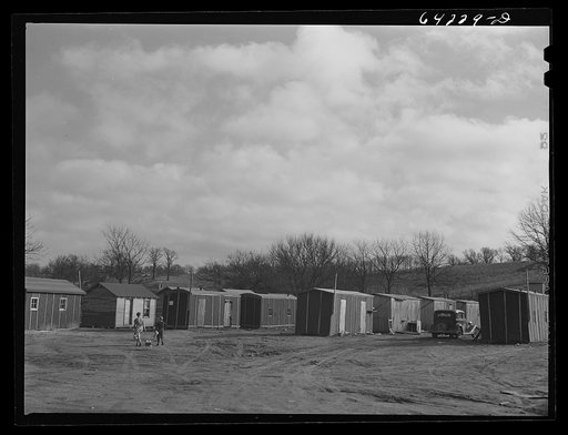 Newton County, Missouri. Camp Crowder area. Construction work began in September 1941. Trailer camps, cabins, hotels, liquor stores, cafes, and night clubs stretch along U.S. Highway No. 71 bordering the camp for about ten miles