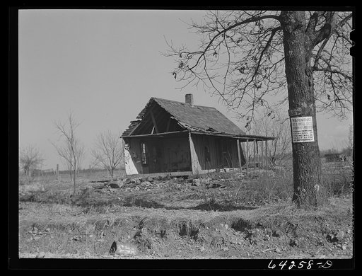 Newton County, Missouri. Camp Crowder area. Farmhouses on land bought by the Army are demolished when construction work moves close to them
