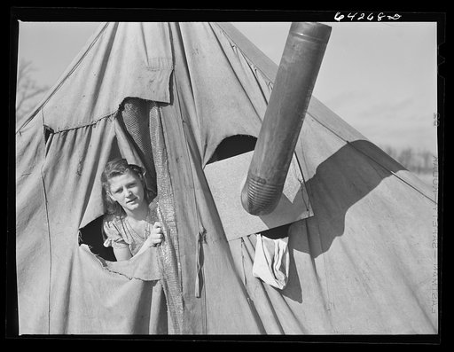 Untitled photo, possibly related to: Newton County, Missouri. Camp Crowder area. Wife of construction worker from Oklahoma living in tent along U.S. Highway No. 71