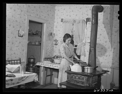 Bates County relocation project, Missouri. Mrs. Fred Whitesell who moved with the aid of FSA (Farm Security Administration) after their land in Newton County, Missouri was bought by the Army for construction of Camp Crowder