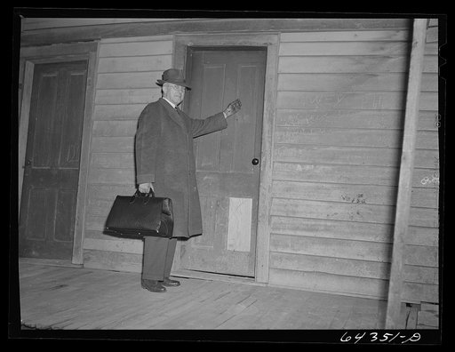 Untitled photo, possibly related to: Scott County, Missouri. Country doctor giving parting advice to mother of sick child