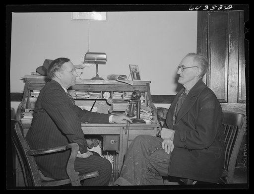 Oran, Missouri. Farmer consulting doctor
