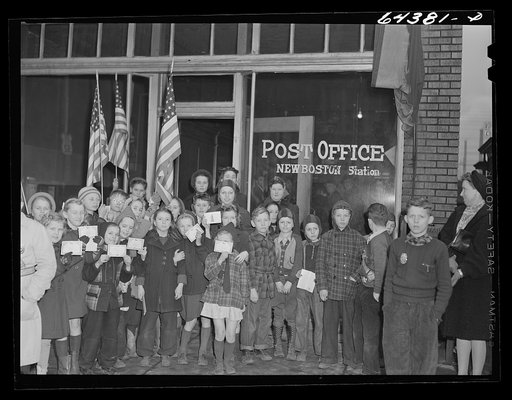 Untitled photo, possibly related to: New Boston, Ohio. Schoolchildren at the post office to buy defense stamps