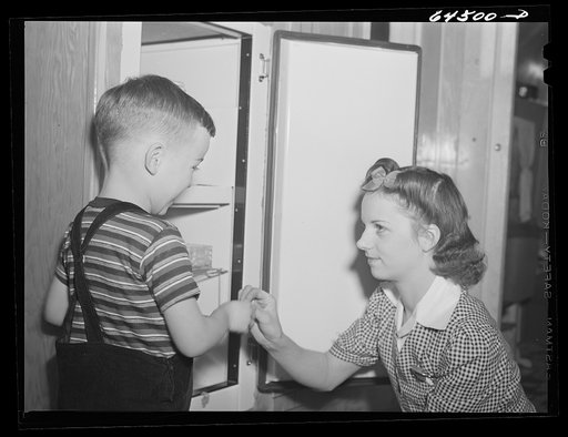 Untitled photo, possibly related to: Burlington, Iowa. Cecil Patrick family. FSA (Farm Security Administration) trailer camp for workers at Burlington ordnance plant
