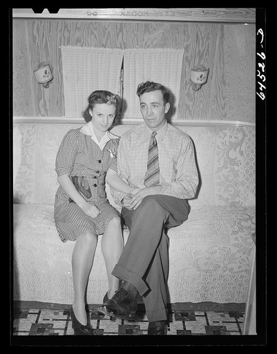 Burlington, Iowa. Acres unit, FSA (Farm Security Administration) trailer camp. Mr. and Mrs. Cecil Patrick in their trailer for workers at Burlington ordnance plant