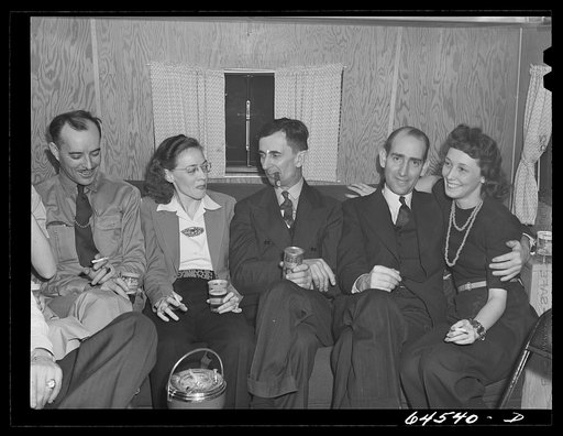 Untitled photo, possibly related to: Burlington, Iowa. Sunnyside unit, FSA (Farm Security Administration) trailer camp. McReynolds family in their trailer for workers at Burlington ordnance plant