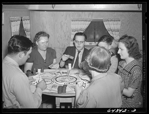 Burlington, Iowa. Sunnyside unit FSA (Farm Security Administration) trailer camp. Sunday evening card game with neighbors in the trailer of the Heller family, who work at the Burlington ordnance plant