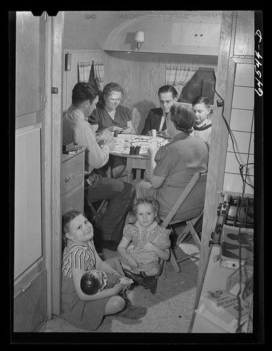 Untitled photo, possibly related to: Burlington, Iowa. Sunnyside unit FSA (Farm Security Administration) trailer camp. Sunday evening card game with neighbors in the trailer of the Heller family, who work at the Burlington ordnance plant