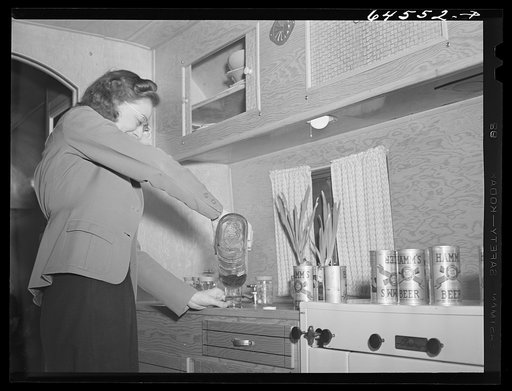 Untitled photo, possibly related to: Burlington, Iowa. Sunnyside unit, FSA (Farm Security Administration) trailer camp. McReynolds family in their trailer for workers at Burlington ordnance plant
