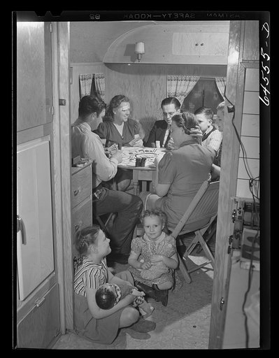 Burlington, Iowa. Sunnyside unit, FSA (Farm Security Administration) trailer camp. Sunday evening card game with neighbors in the trailer of the Heller family, who work at the Burlington ordnance plant