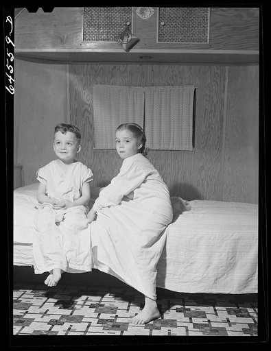 Burlington, Iowa. Acres unit, FSA (Farm Security Administration) trailer camp. Cecil Patrick's kids going to bed in their trailer for workers at Burlington ordnance plant