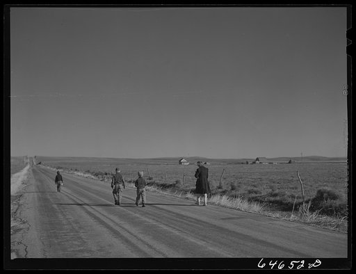 Mobridge, South Dakota (vicinity). Farm children going home from school