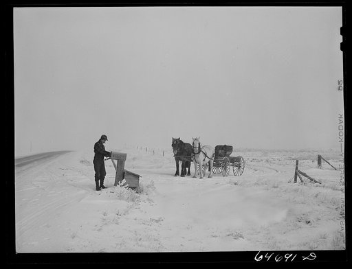 Untitled photo, possibly related to: Morton County, North Dakota. Farm boy bring home the morning mail