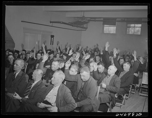 Williston, North Dakota. Farmers' union meeting with the county commissioners to protest the selling of land to corporation farms in Williams County and to discuss the protection of the family-size farm