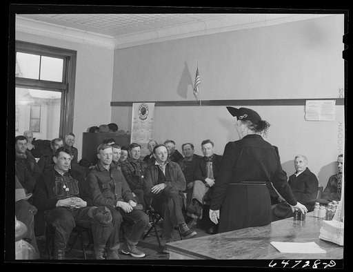 Gladstone, North Dakota. FSA (Farm Security Administration) home supervisor addressing a group of farmers at Food for Victory meeting