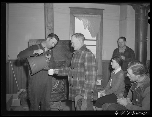 Adams County, North Dakota. Farmers brought their own lunch to an all-day Food for Victory meeting. Coffee was served by one of the ladies. The meeting was held in the rural school house