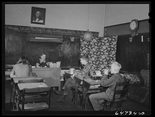 Williams County, North Dakota. Lunchtime in a rural school of three pupils