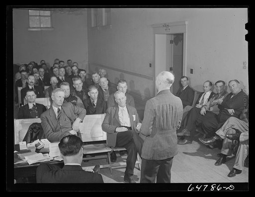 Williston, North Dakota. Farmers' union meeting with the county commissioners to protest the selling of land to corporation farms in Williams county and to discuss the protection of the family-size farm
