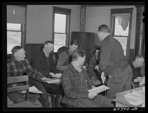 Untitled photo, possibly related to: Adams County, North Dakota. Farmers at Food for Victory meeting in a rural school