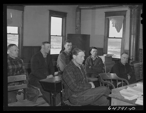 Untitled photo, possibly related to: Adams County, North Dakota. Farmers at Food for Victory meeting in a rural school