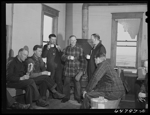 Adams County, North Dakota. Farmers brought their own lunch to an all day Food for Victory meeting. Coffee was served by one of the ladies. The meeting was held in the rural school house