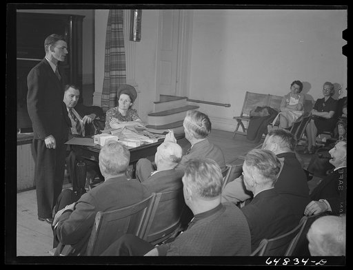 Untitled photo, possibly related to: Williston, North Dakota. County commissioner addressing meeting of farmers' union to protest to the county commissioners the selling of land to large corporation farms in Williams County