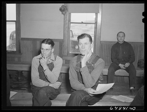 Adams County, North Dakota. Farmers at Food for Victory meeting in a rural school