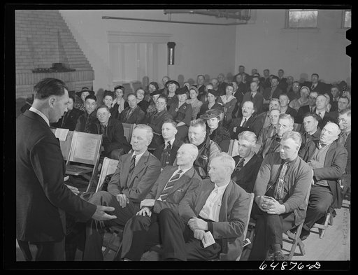 Williston, North Dakota. Farmers' union meeting with the county commissioners to protest the selling of land to corporation farms in Williams County and to discuss the protection of the family-size farm