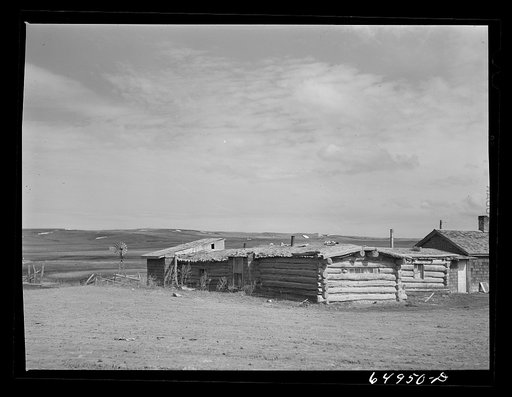 Sand Springs, Montana. Log buildings, a general store and post office in Garfield County