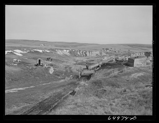 McCone County, Montana. Coal mine on the edge of the badlands. The operator lives in sheep wagon