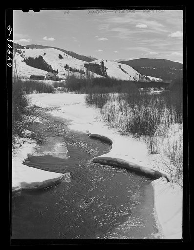 Beaverhead County, Montana. Ice and snow melting along the Big Hole River