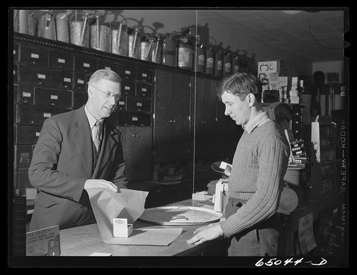 Williston, North Dakota. Mr. Dahlen, hardware merchant, in his store. Mr. Dahlen is county chairman for the defense savings campaign