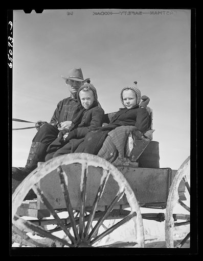 Untitled photo, possibly related to: Wheatland County, Montana. Farmer and daughters driving to town