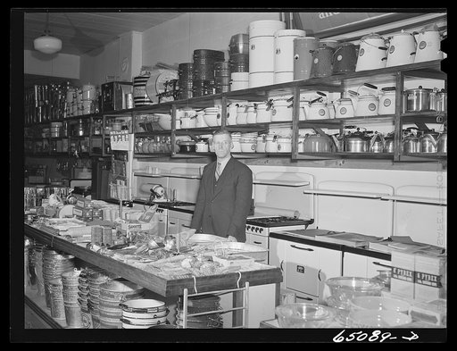 Williston, North Dakota Mr. Dahlen, hardware merchant, in his store. Mr. Dahlen is county chairman for the defense savings campaign