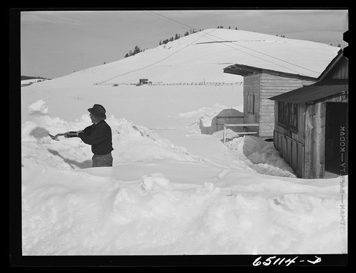 Granite County, Montana. Shoveling a path out to the highway