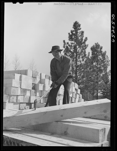 Untitled photo, possibly related to: Kalispell, Montana. Flathead Valley special area project. Stacking railroad ties at cooperative sawmill. This sawmill is operated by the FSA (Farm Security Administration) borrowers who settled here after leaving the drought areas of eastern Montana and the Dakot