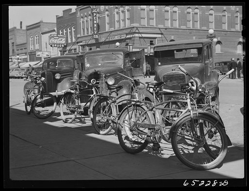Kalispell, Montana. Parked cars and bicycles on Saturday afternoon